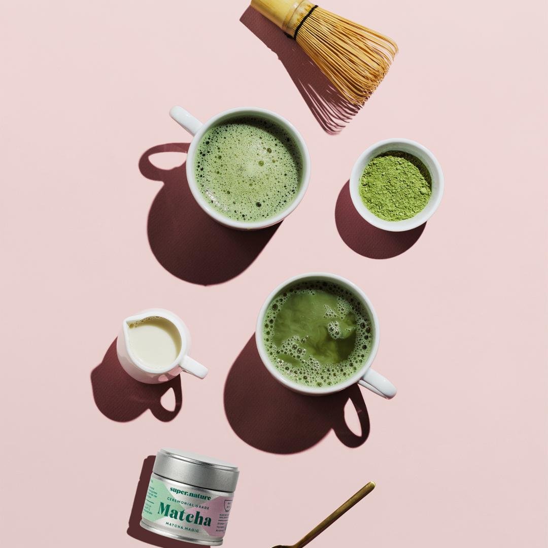 Image of Matcha in the making with pink background. 